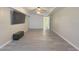 Finished basement with large TV and vinyl flooring at 8791 Daerwater Dr, Winston, GA 30187