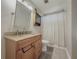 Bathroom with tub, vanity, and granite countertop at 8791 Daerwater Dr, Winston, GA 30187