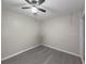 Small bedroom with gray flooring and ceiling fan at 8791 Daerwater Dr, Winston, GA 30187