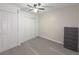Simple bedroom with closet and gray flooring at 8791 Daerwater Dr, Winston, GA 30187