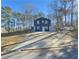Two-story house with driveway and landscaping at 8791 Daerwater Dr, Winston, GA 30187