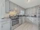 Updated kitchen with granite countertops at 8791 Daerwater Dr, Winston, GA 30187