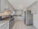 Kitchen with granite counters and stainless steel appliances at 8791 Daerwater Dr, Winston, GA 30187