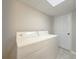 Basement laundry room with washer and dryer at 8791 Daerwater Dr, Winston, GA 30187
