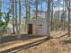 Small storage shed in backyard at 8791 Daerwater Dr, Winston, GA 30187