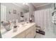 Clean bathroom with shower/tub and white vanity at 2040 Hickory Station Cir, Snellville, GA 30078