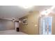 Spacious bonus room with vaulted ceiling, ceiling fan, and access to other rooms at 2040 Hickory Station Cir, Snellville, GA 30078