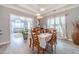 Dining room with hardwood floors and access to kitchen at 2040 Hickory Station Cir, Snellville, GA 30078