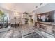 Open concept living space with TV and dining area at 2040 Hickory Station Cir, Snellville, GA 30078