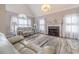 Living room features a fireplace and vaulted ceilings at 2040 Hickory Station Cir, Snellville, GA 30078