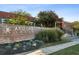 Arizona Lofts building exterior with landscaping and brick facade at 195 Arizona Ne Ave # 158, Atlanta, GA 30307