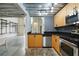 Modern kitchen with stainless steel appliances and patterned backsplash at 195 Arizona Ne Ave # 158, Atlanta, GA 30307