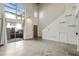 Open living area with high ceilings and concrete floors at 195 Arizona Ne Ave # 158, Atlanta, GA 30307