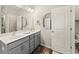 Modern bathroom with double vanity and gray cabinets at 279 Commons Ave, Woodstock, GA 30188