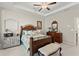 Charming bedroom with wooden bed frame and light blue bedding at 279 Commons Ave, Woodstock, GA 30188