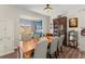 Bright dining area with farmhouse table and built-in hutch at 279 Commons Ave, Woodstock, GA 30188