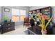 Bright home office with built-in bookshelves and leather chair at 279 Commons Ave, Woodstock, GA 30188