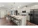 Modern kitchen with granite countertops and stainless steel appliances at 279 Commons Ave, Woodstock, GA 30188