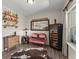 Rustic sitting area with wine cooler, couch and cowhide rug at 279 Commons Ave, Woodstock, GA 30188