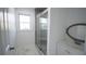 Clean bathroom with a walk-in shower and updated vanity at 2982 Cruse Rd, Lawrenceville, GA 30044