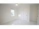 Well-lit bedroom, featuring gleaming floors and a closet at 2982 Cruse Rd, Lawrenceville, GA 30044