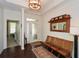 Bright entryway with hardwood floors and antique mirror at 314 Pepperwood Way, Canton, GA 30114