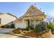 Two-story home with attached garage and manicured landscaping at 314 Pepperwood Way, Canton, GA 30114