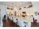 Large kitchen island with granite countertops and stainless steel appliances at 314 Pepperwood Way, Canton, GA 30114