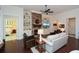 Living room features a stone fireplace and hardwood floors at 314 Pepperwood Way, Canton, GA 30114