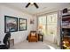 Home office with built-in shelving and stained glass window at 314 Pepperwood Way, Canton, GA 30114