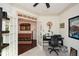 Home office with French doors and built-in shelving at 314 Pepperwood Way, Canton, GA 30114