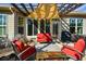 Relaxing patio with pergola, seating, and grill at 314 Pepperwood Way, Canton, GA 30114