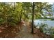 Nature trail alongside a serene lake at 314 Pepperwood Way, Canton, GA 30114