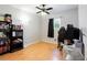 Bright bedroom with hardwood floors, ceiling fan, and ample closet space at 510 Coventry Rd # 19A, Decatur, GA 30030