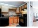 Well-equipped kitchen featuring stainless steel appliances and wood cabinets at 510 Coventry Rd # 19A, Decatur, GA 30030