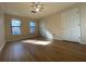 Bright bedroom with wood-look floors and ample closet space at 8263 Canyon Forge Dr, Riverdale, GA 30274