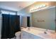 Bathroom with a double vanity and shower/tub combo at 103 Ashwood N Ct, Stockbridge, GA 30281