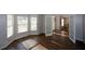 Bright living room with hardwood floors and French doors at 103 Ashwood N Ct, Stockbridge, GA 30281
