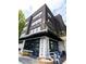 Stylish corner building with retail space and outdoor seating at 130 Rolison Way, Fayetteville, GA 30214