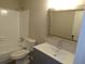 Updated bathroom with new vanity, mirror and bathtub at 2482 Northlake Ct, Atlanta, GA 30345