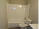 Clean bathroom with shower/tub combo and white tile at 2482 Northlake Ct, Atlanta, GA 30345