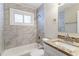 Updated bathroom with granite vanity and tile shower/tub combo at 2792 Plantation Dr, Atlanta, GA 30344