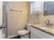 Clean bathroom with granite countertop and marble tile at 2792 Plantation Dr, Atlanta, GA 30344