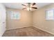Spacious bedroom with ceiling fan and carpet at 2792 Plantation Dr, Atlanta, GA 30344