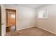 Bedroom with neutral decor, carpet, and double closets at 2792 Plantation Dr, Atlanta, GA 30344