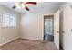 Bedroom with ceiling fan and access to another room at 2792 Plantation Dr, Atlanta, GA 30344