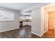 Dining room with vinyl flooring and access to kitchen and bathroom at 2792 Plantation Dr, Atlanta, GA 30344