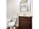 Clean bathroom, featuring a vanity with dark brown cabinets at 915 Highwood Ln, Atlanta, GA 30344