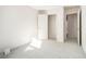 Bedroom with neutral carpet, multiple doors, and a closet at 915 Highwood Ln, Atlanta, GA 30344