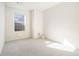 Bright bedroom with a large window and neutral carpet at 915 Highwood Ln, Atlanta, GA 30344